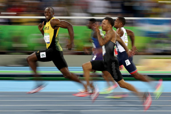 Usain Bolt Manages to be Epic and Cheeky at the Same Time [image source: time.com], crowd ink, crowdink, crowdink.com, crowdink.com.au