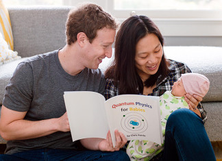 Mark Zuckerberg reading quantum physics book to daughter Max, www.crowdink.com