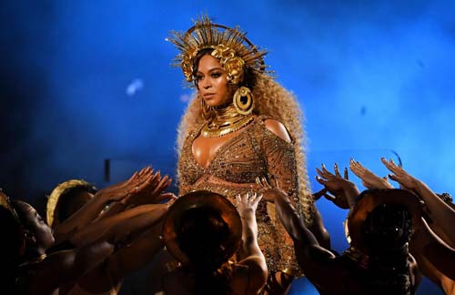 Beyoncé performs while heavily pregnant at the 59th Grammy Awards in Los Angeles earlier this year Kevork Djansezian/Getty
